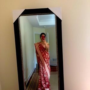 Orange red and gold embroidered saree